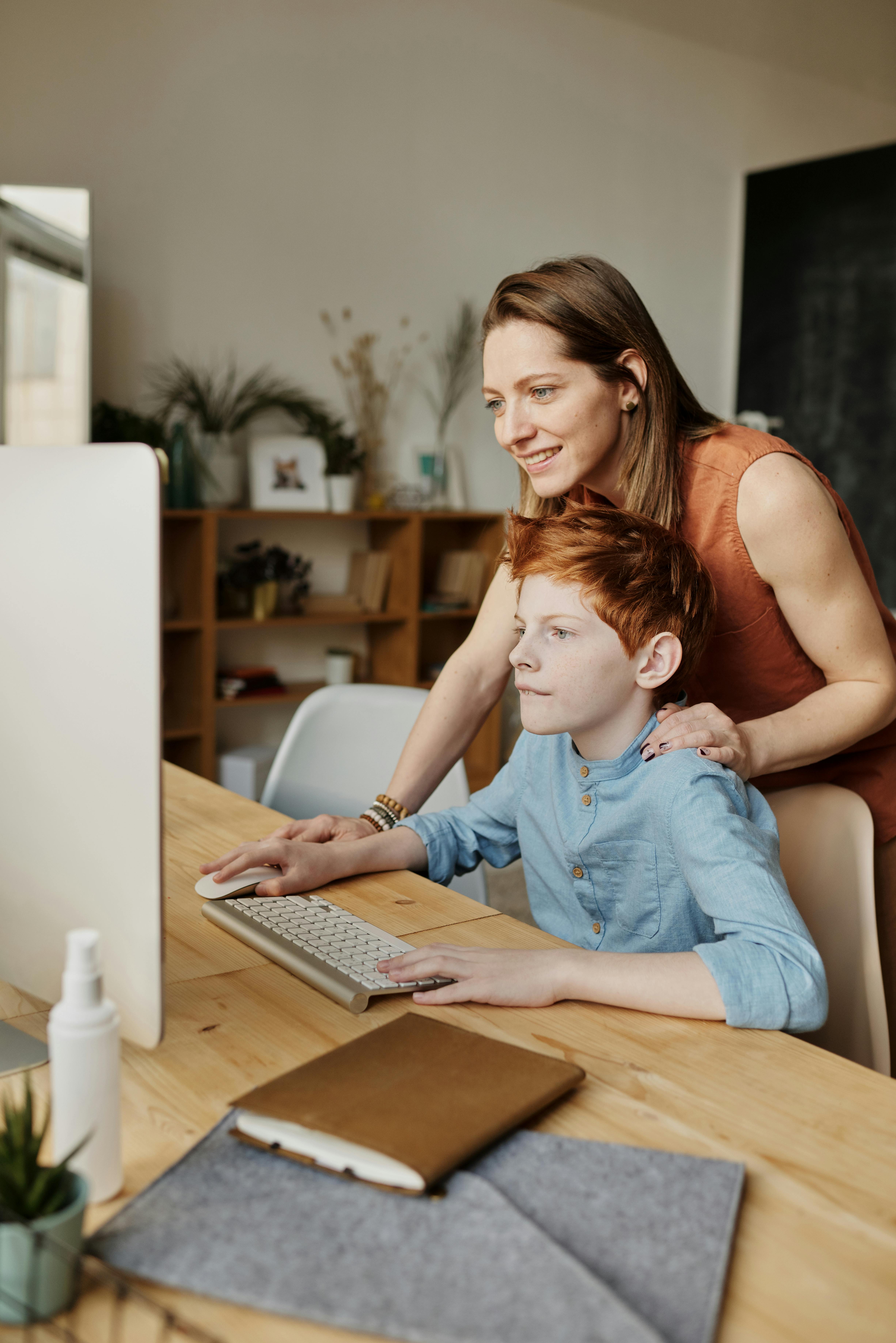 Happy kid learning to code